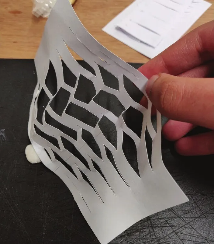 miura-ori tessellations: cuts with irregular patterns: laser-cut irregular cut pattern
