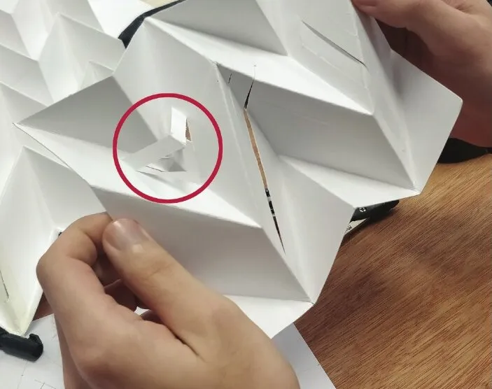 miura-ori tessellations: cuts with irregular patterns: testing aperture opening by hand