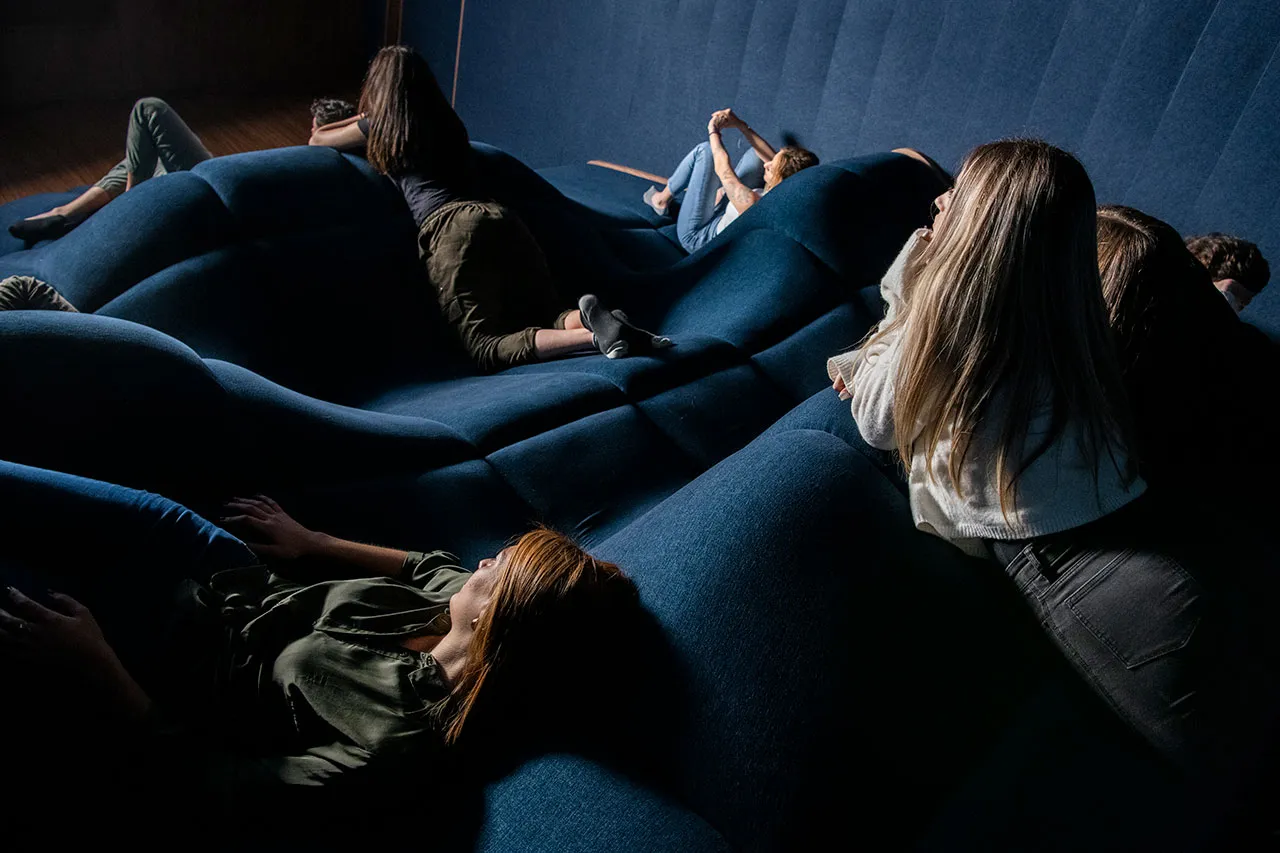 The audience settling into the seating terrain