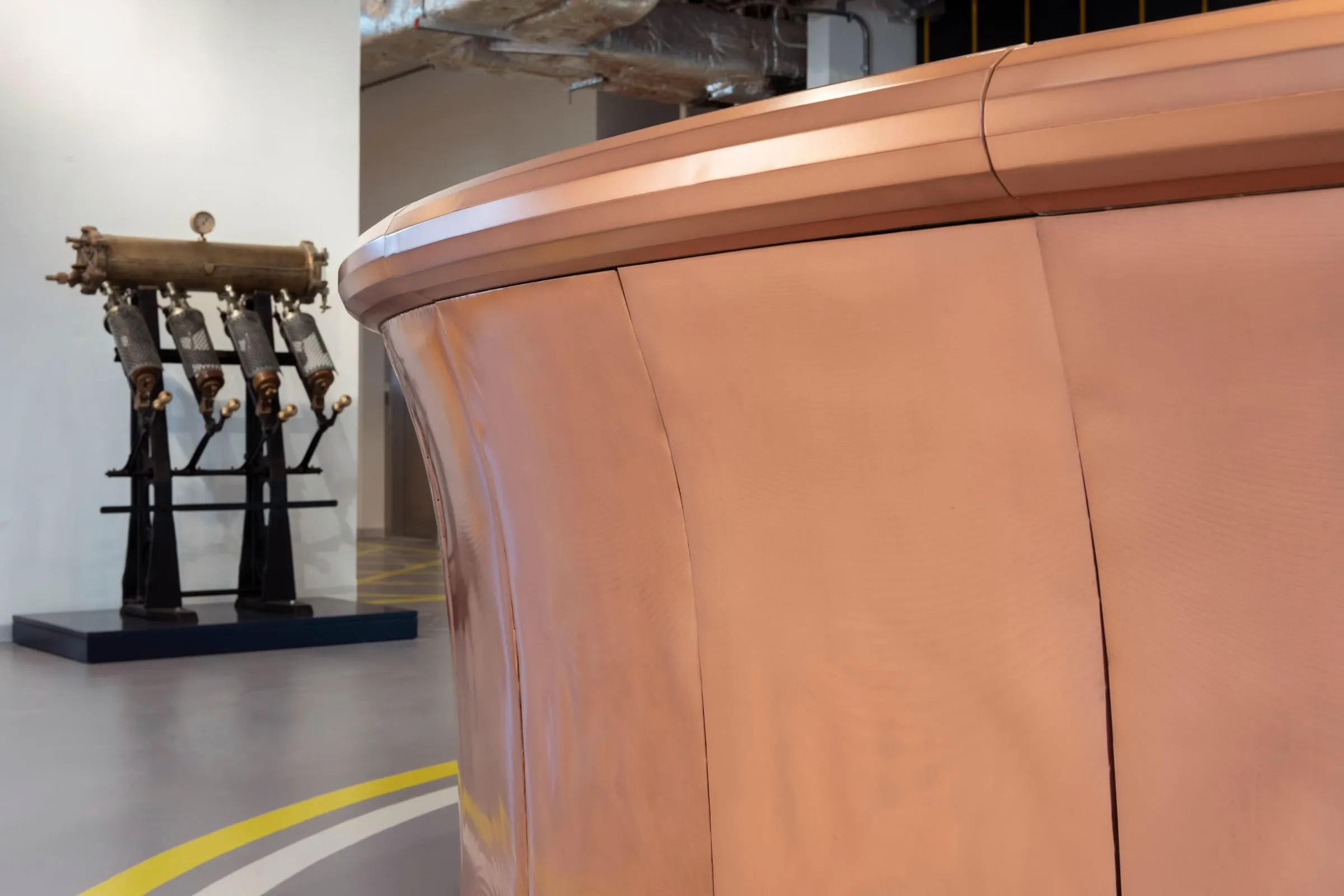 farsons old brewhouse desk, the panels flare out towards the rail