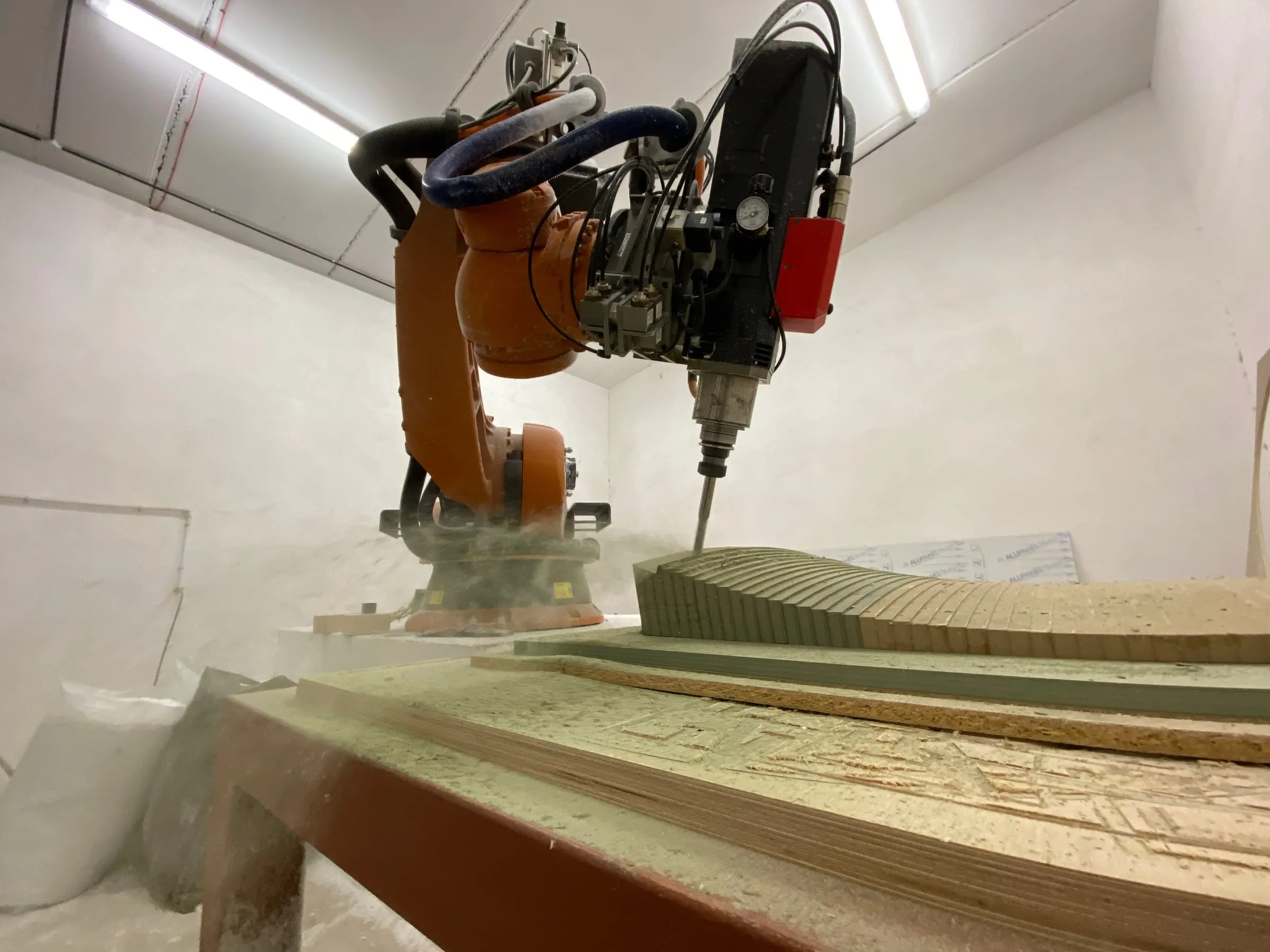 farsons old brewhouse desk, the robot milling a stack of moisture-resistant mdf to the curve