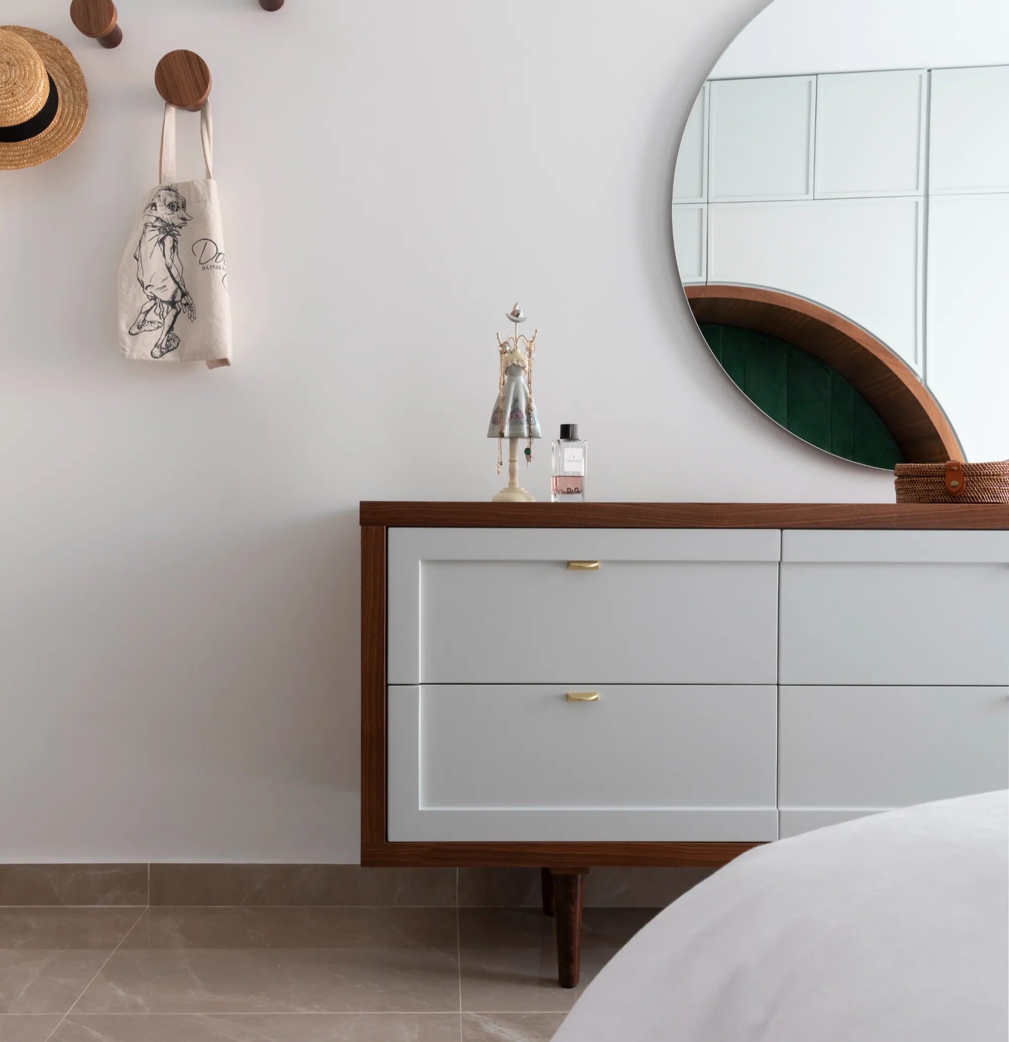 A custom-built walnut and MDF freestanding chest of drawers